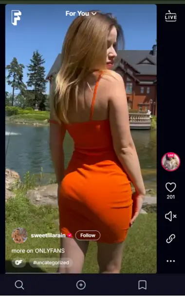 Sweetlilarain in an beautiful orange dress in sunshine